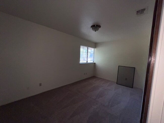 Building Photo - Freshly painted home with new carpet. 3 Ca...