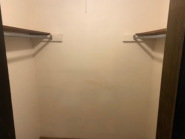 walk in closet for bedroom 1 - 128 W Sycamore St