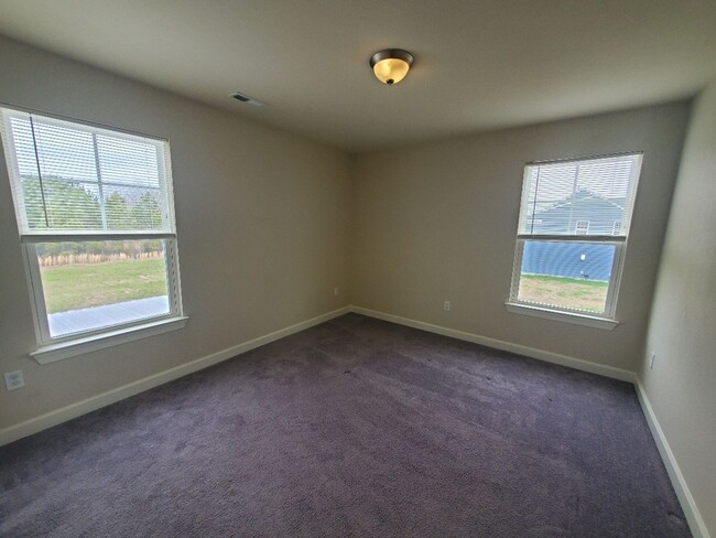 Building Photo - Luxurious 4BR/2.5BA Home with Spacious Living Spaces and Elegant Touches