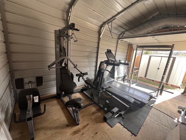 Home gym pulls system, treadmill, squat rack. - 422 S Olive St