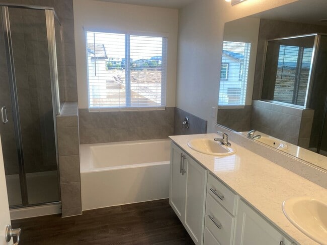 Building Photo - brand-new with two car garages, four bedro...