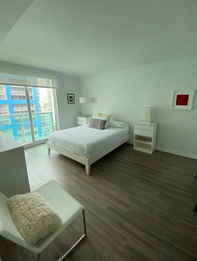 Building Photo - Furnished 1BR Condo with Stunning Bay View...