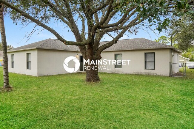 Building Photo - 4 Bedroom Pet-Friendly Home in Palm Bay, F...
