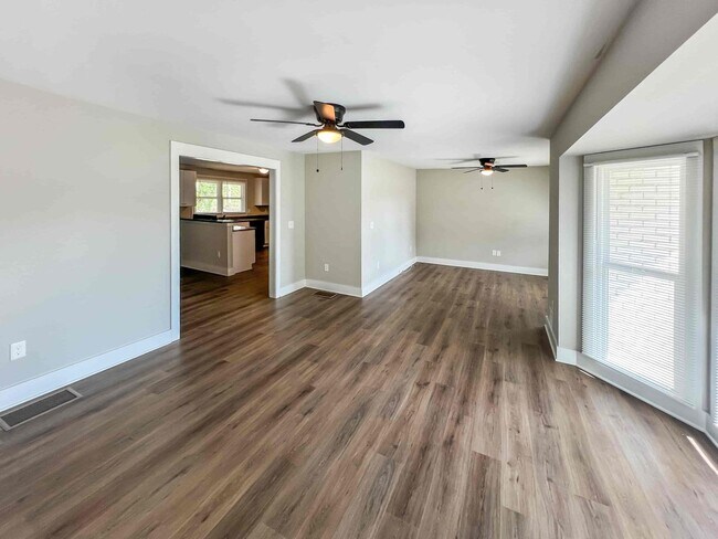 Building Photo - Completely Renovated 3 BR/3 BA Ranch with ...