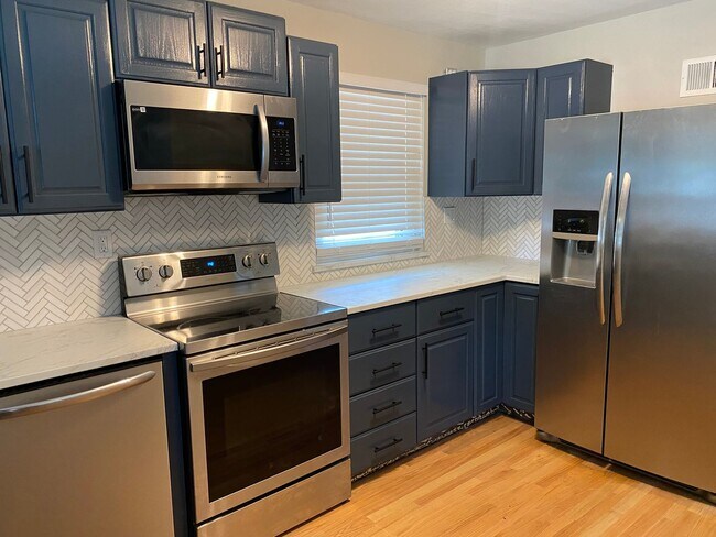 Building Photo - Newly Renovated Home with 2 Car garage in ...
