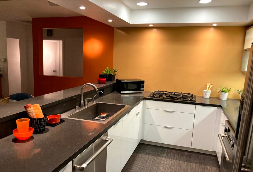 Kitchen Countertops Open To Dining Area - 8616 Wonderland Ave