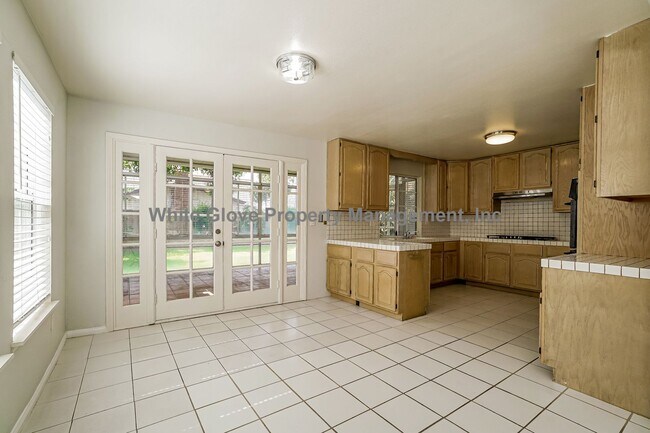 Building Photo - Charming 4-Bedroom Artesia Home with Sunroom, Large Backyard & Attached Garage