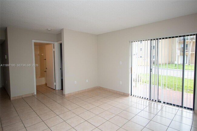 Building Photo - 9491 Palm Cir S