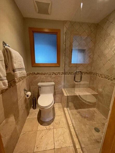 Primary Bath with Designer Tile Surround & Walk-in Shower - 45 Benthaven Pl