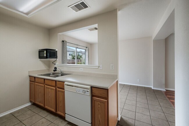 Building Photo - Well-Maintained Home with Open Layout & Great Location