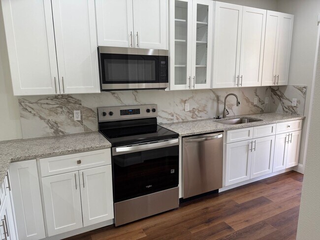 Building Photo - Brand new 3/2/1 with screed in porch and fenced yard! 2 units available