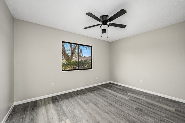 Building Photo - Charming Palm Bay Retreat - Perfect for Relaxation and Entertainment!