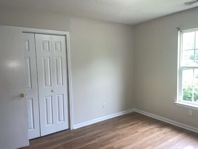 Building Photo - Two Bedroom Two Full Bathroom End Unit Tow...