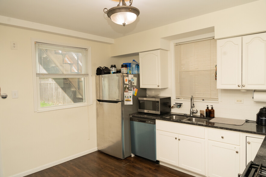Kitchen with stainless steel appliances - 3350 W Cuyler Ave