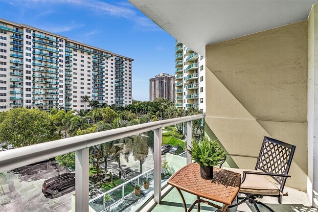 Building Photo - 19380 Collins Ave