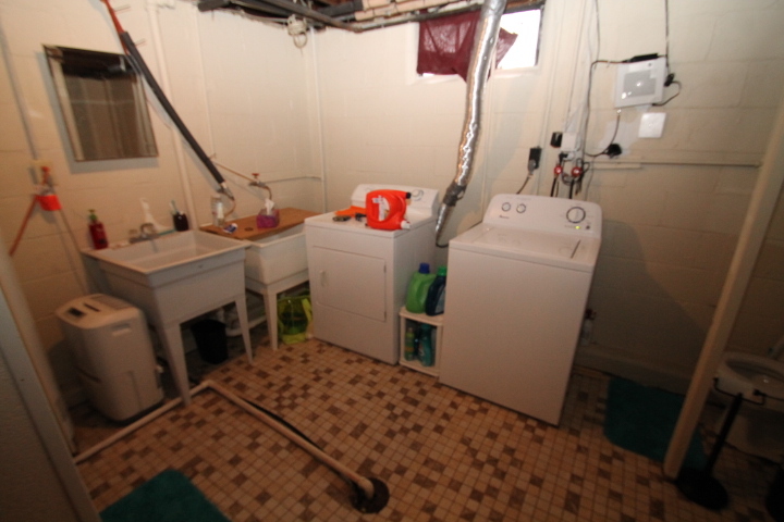 Tiled Laundry area - 215 W 12th St