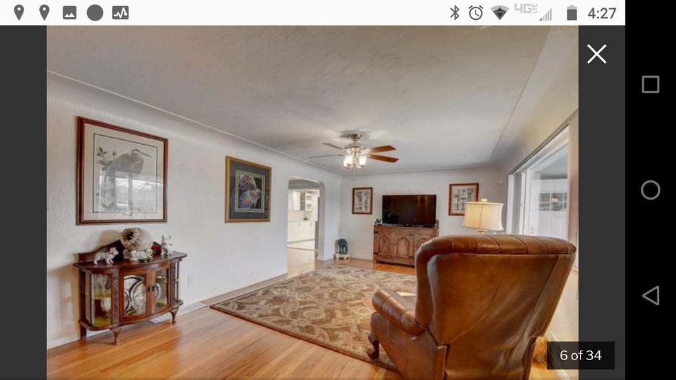 Spacious Living room with hard wood flooring. - 1808A Simms St
