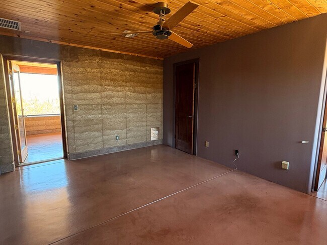 Building Photo - Desert Home on 3.3 Acres with Rooftop Views & Unique Rammed Earth Design
