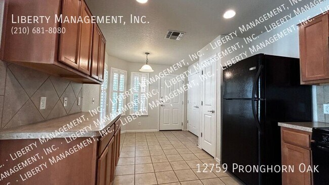 Building Photo - 12759 Pronghorn Oak
