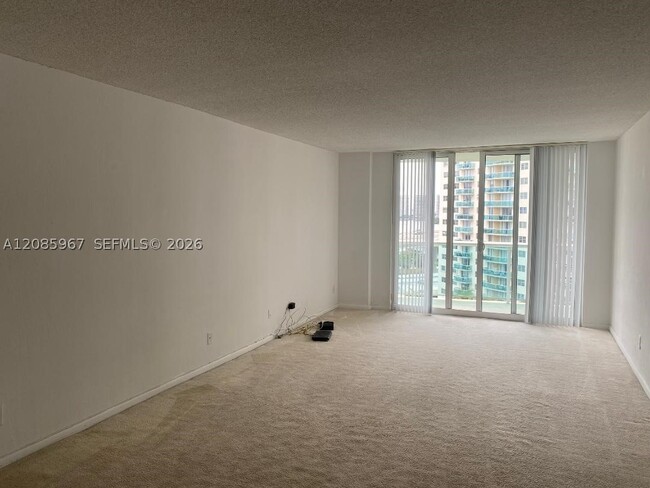 Building Photo - 19380 Collins Ave