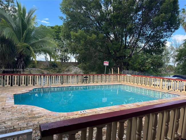 Building Photo - 4265 NW S Tamiami Canal Dr