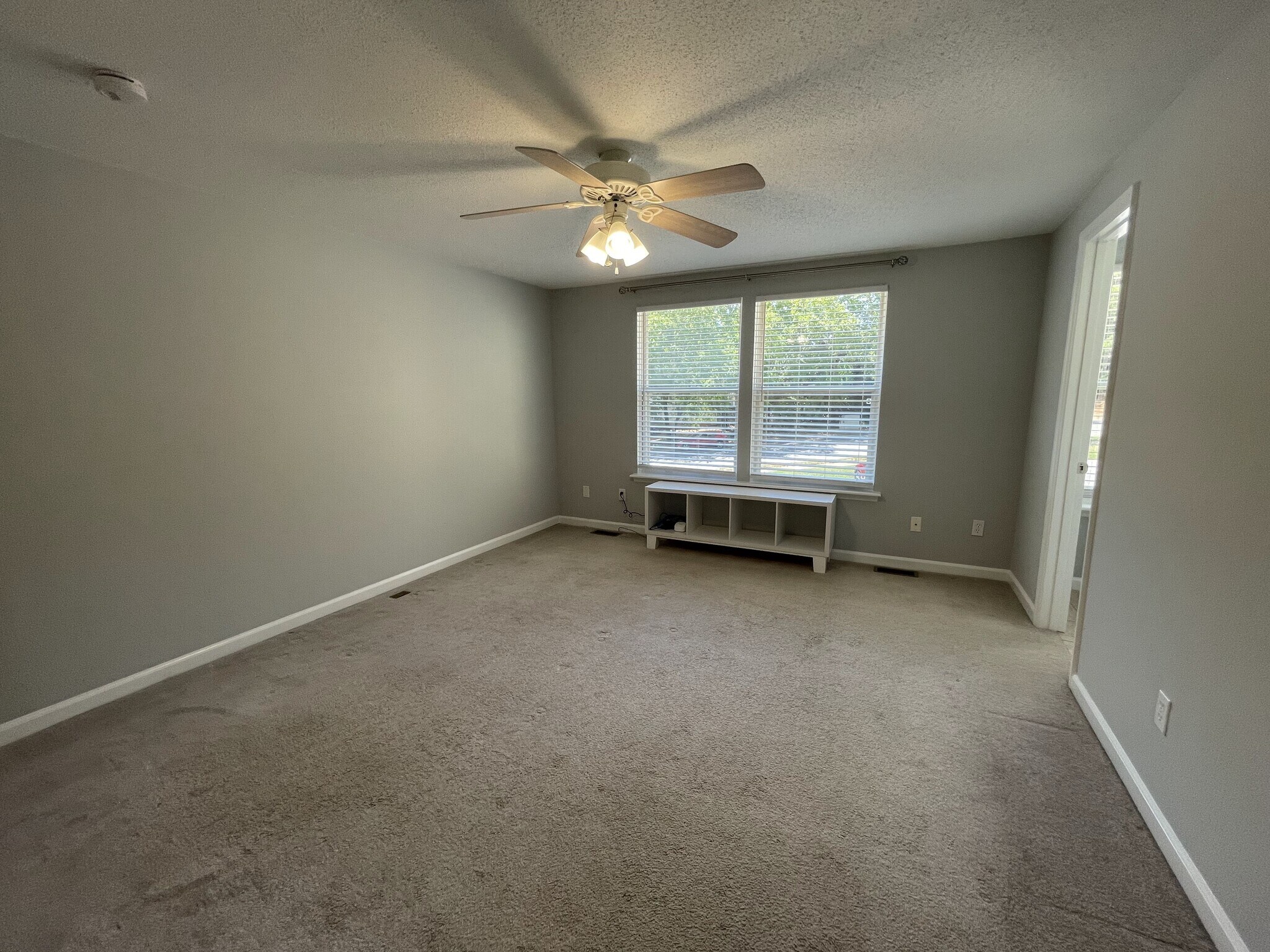 Main bedroom with cordless two-inch room darkening blinds. Curtain rods installed and ready. Curtain - 4204 Whistler Ct