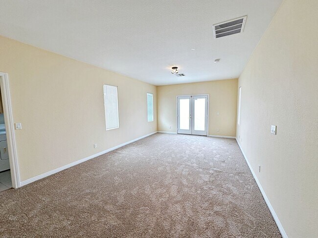 Building Photo - 4 BEDROOM HOME 3 CAR GARAGE ON A CORNER LO...