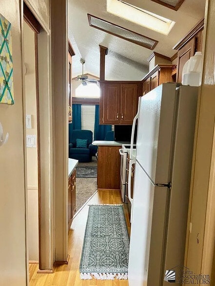 A nice galley kitchen, easy to cook in! - 11489 S Clara Anita Dr
