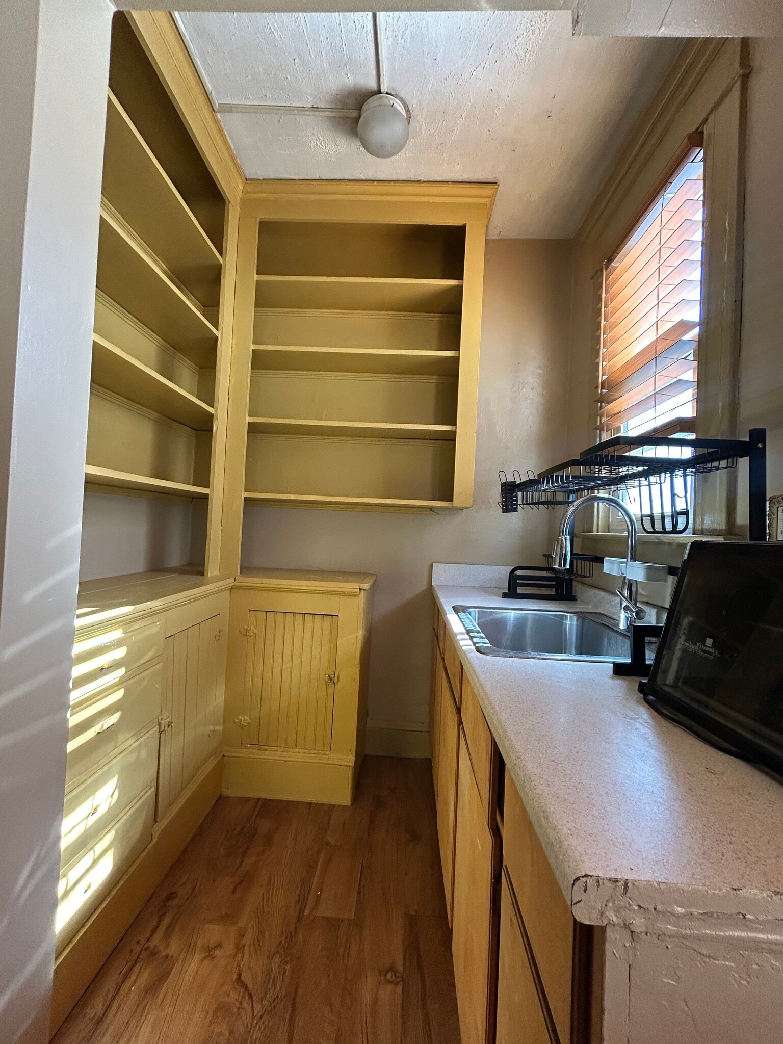Kitchen sink and cabinets - 187 Alden Ave