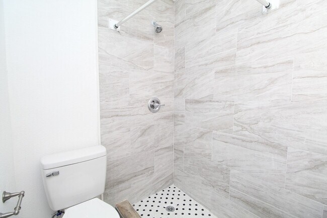 Building Photo - 4BR Home with LVP Flooring, Open Layout & Large Backyard Near Dogwood