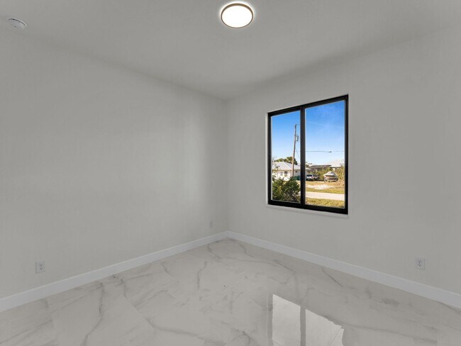 Building Photo - Brand-New Home for Rent – Port Charlotte, ...