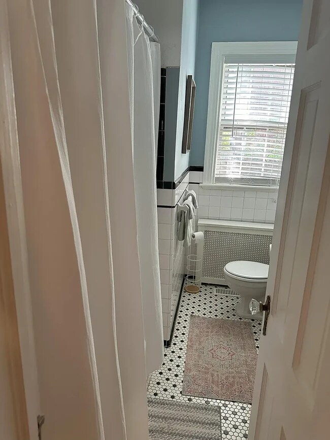 Hall full bath - 4405 W Franklin St