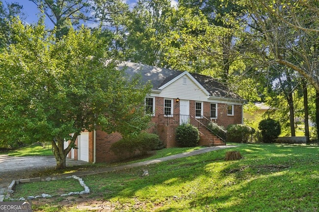Building Photo - 5659 Whispering Pines Rd