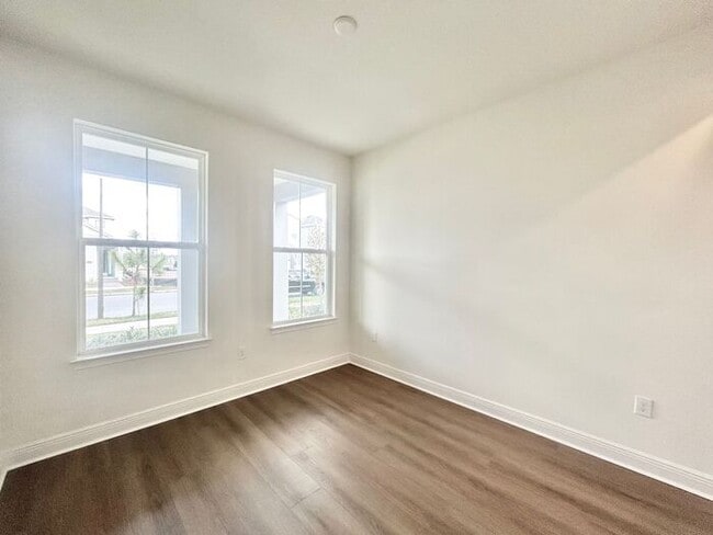 Building Photo - Gorgeous 4/3 Residence with a Private Back Lanai and a 3 Car Garage in the Delightful Laureate Pa...