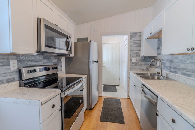 Building Photo - Price Drop!! Cute & Cozy 2-Bedroom Home Ne...