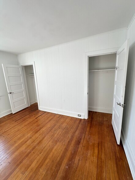 Bedrooms with original wood floors, LARGE walk in closets. - 328 High St