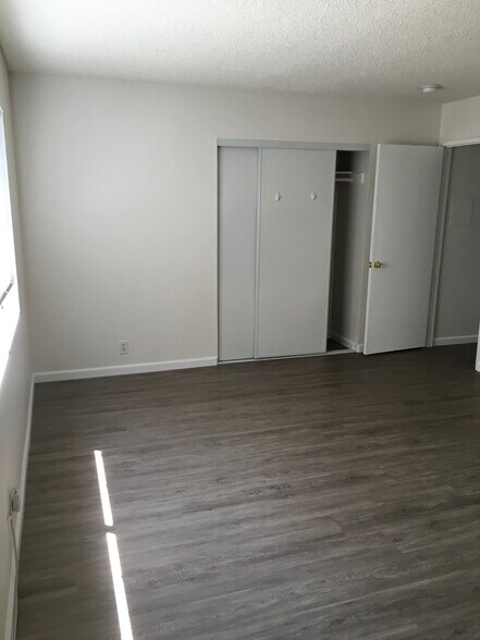 Bedroom 1 (with closet 1 of 2 in the room) (note: hardware and ceilings updated) - 1924 Park Grove Ave