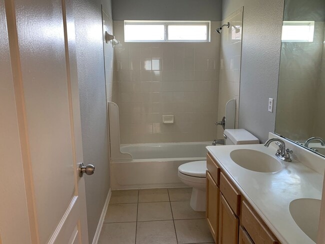 Building Photo - This beautiful home has 4 bedrooms, 2.1 baths and is perfect for an active family. There are thre...