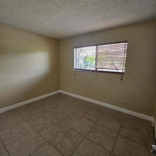 Building Photo - 8540 N Sherman Cir