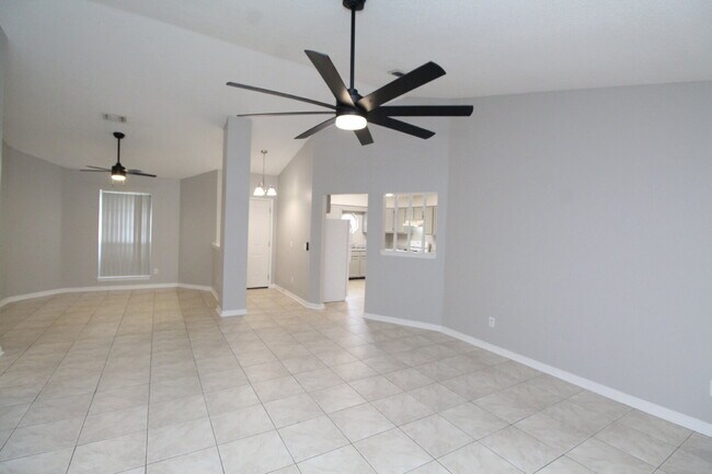 Building Photo - West Pensacola Brick Home with Vaulted Ceilings, Split Floor Plan, Open Living Design & Easy Acce...