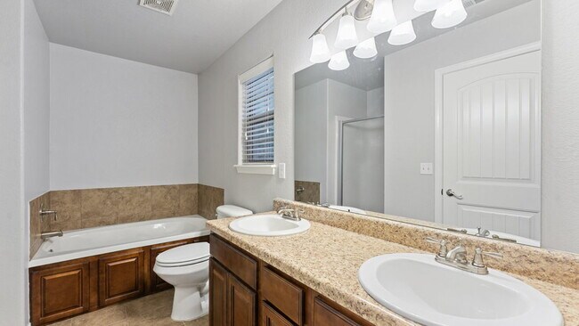 Building Photo - "Delightful 4-Bed Bentonville Haven with C...