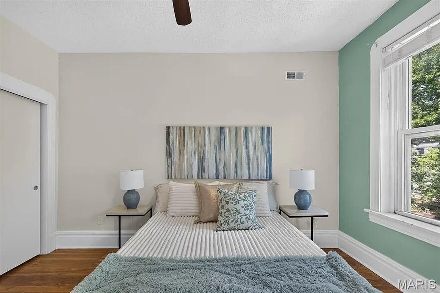 First bedroom upstairs, two closets. - 1731 Nicholson Pl