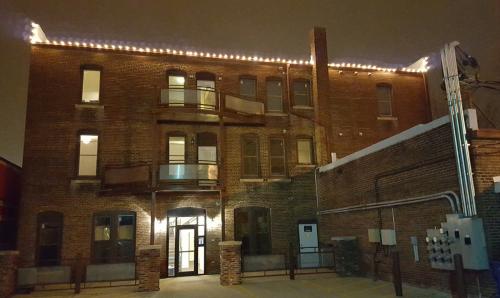 Back entrance and parking lot - 315 E University Ave