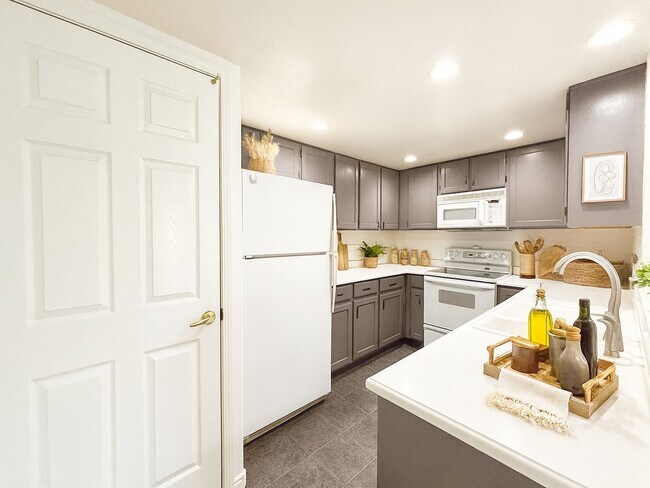 Building Photo - 3BR w/ Top-Floor Privacy near Jordan River Parkway Trail