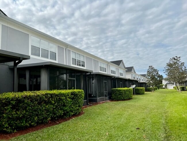 Building Photo - MOVE IN AUGUST! Beautiful 3 bed 2.5 bath townhome with large screened in back porch & 1 car attac...