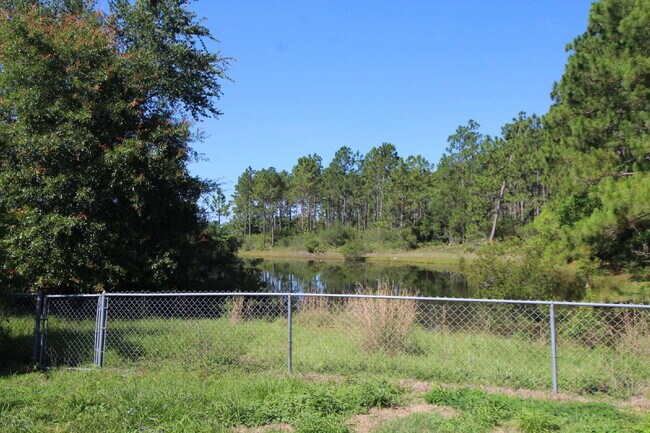 Building Photo - SW Pensacola Creek-Front Home with Screened Porch!
