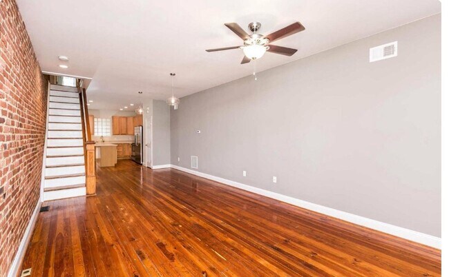 Building Photo - Charming 2bdrm 2.5 bath Patterson Park home with parking and rooftop deck