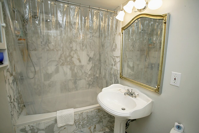 Bathroom with marble tile - 501 Slaters Ln