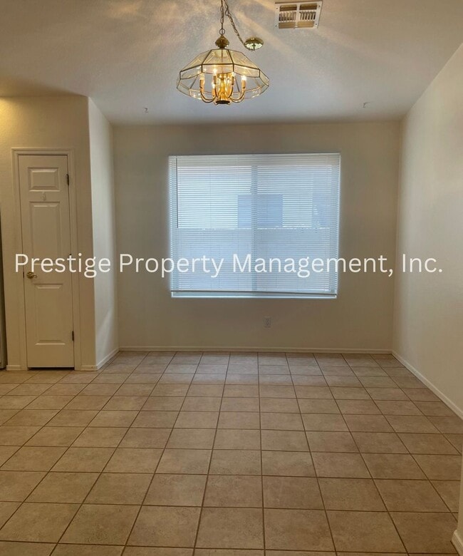 Building Photo - Charming All Tile 4/2 Rita Ranch Home