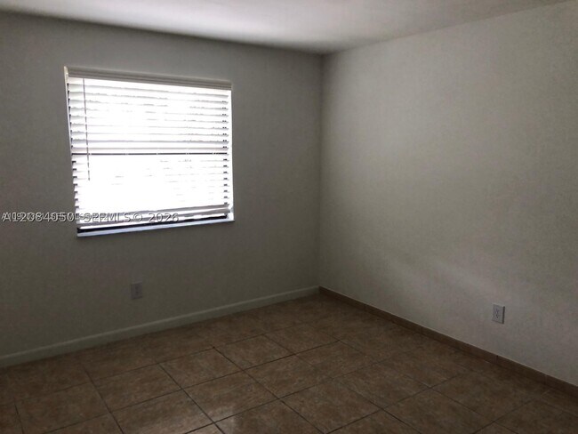 Building Photo - 6575 W 24th Ct
